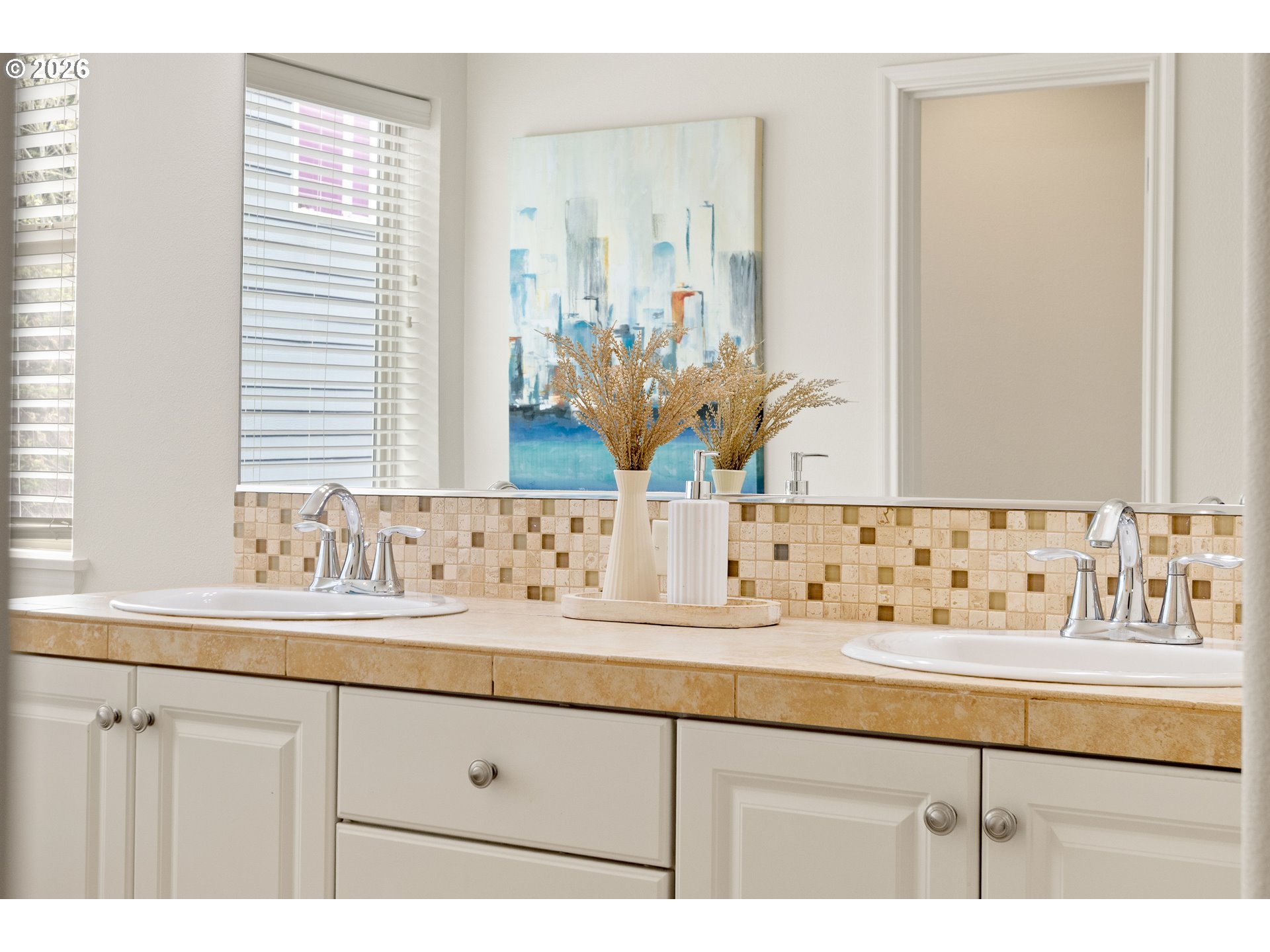 6512 Northwest 165th Avenue Portland, OR 97229 - Photo 23 of 42 a bathroom with a sink and a mirror