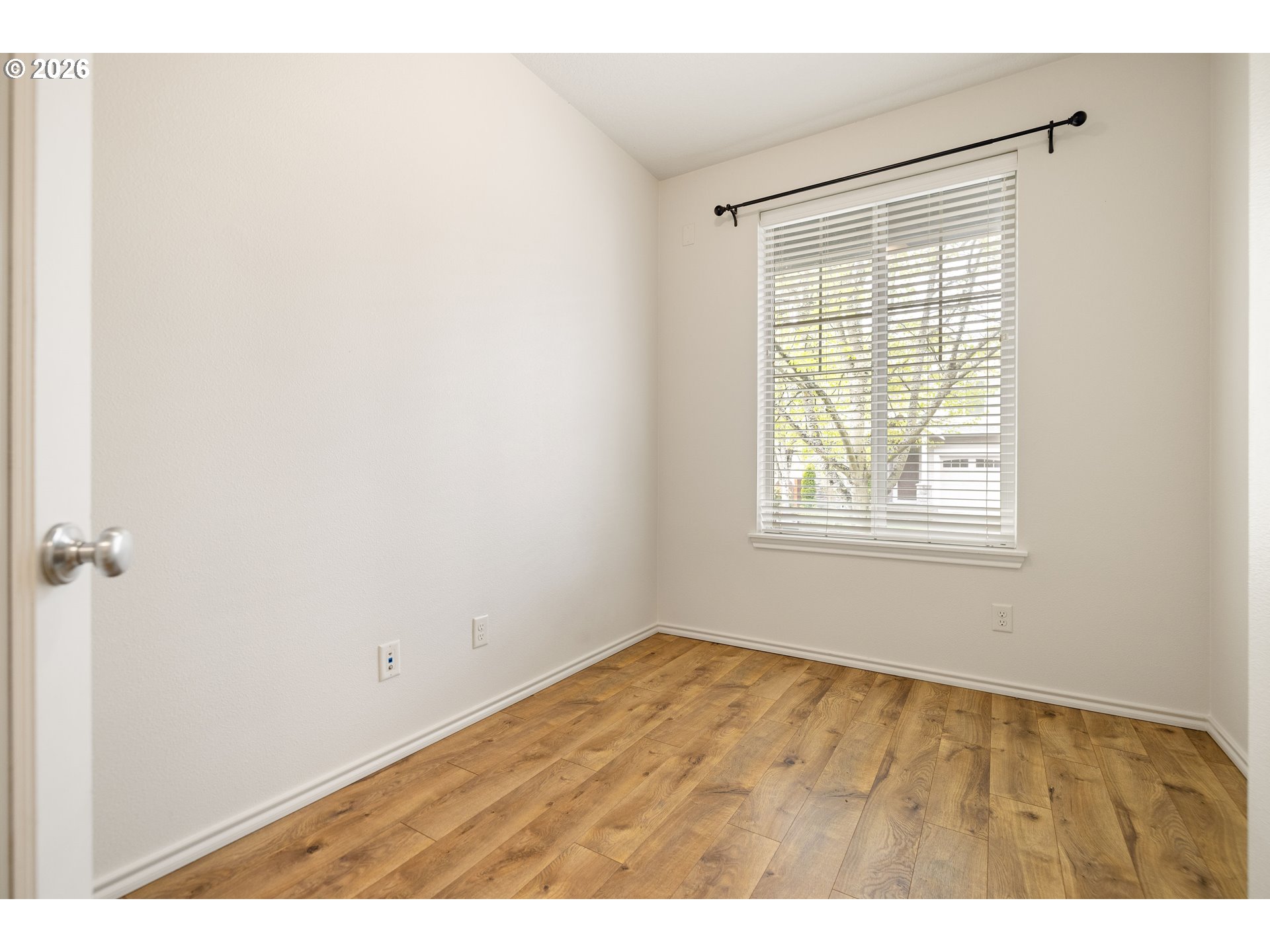 6512 Northwest 165th Avenue Portland, OR 97229 - Photo 33 of 42 a view of an empty room with a window