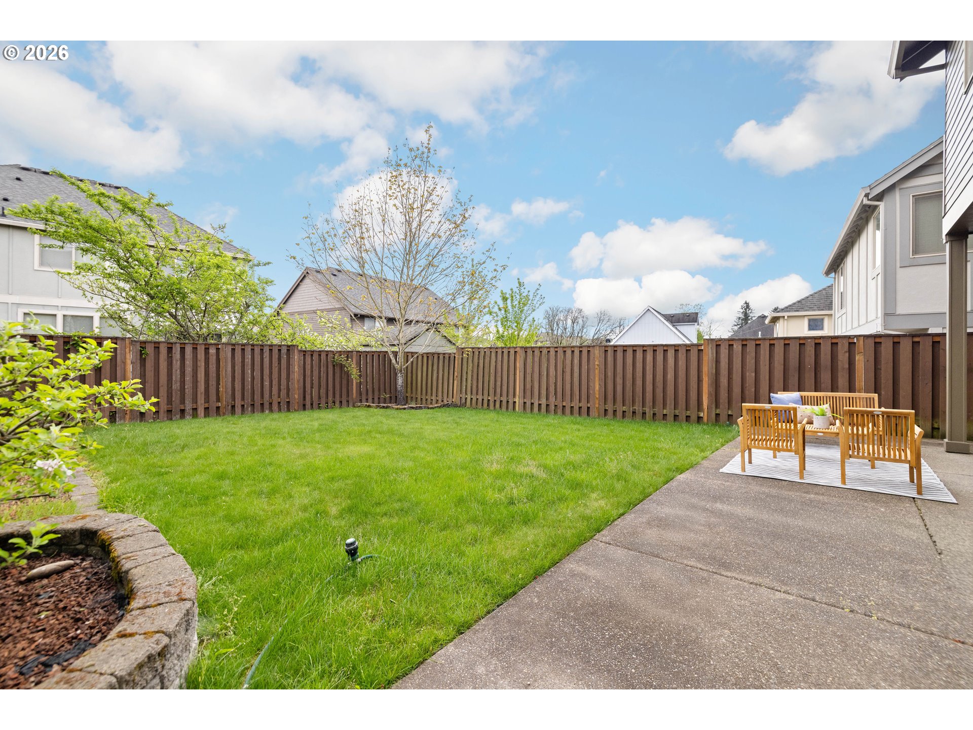 6512 Northwest 165th Avenue Portland, OR 97229 - Photo 38 of 42 a view of backyard with wooden fence