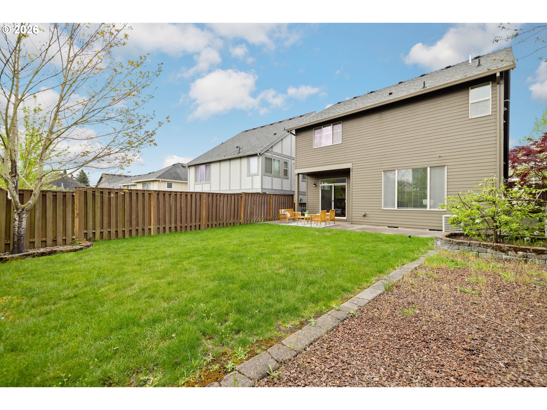 6512 Northwest 165th Avenue Portland, OR 97229 - Photo 39 of 42 a view of an house with backyard and garden