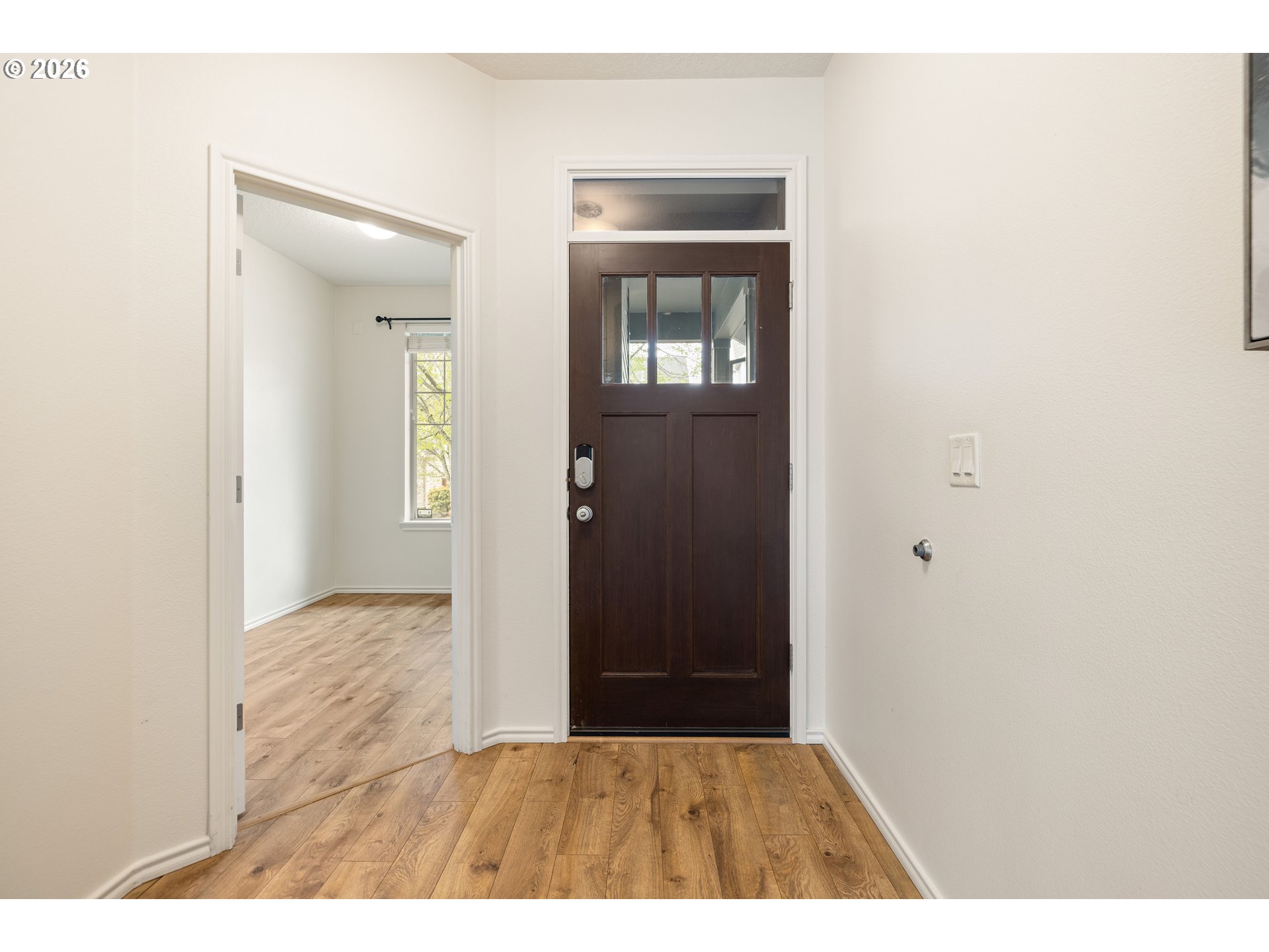 6512 Northwest 165th Avenue Portland, OR 97229 - Photo 5 of 42 a view of hallway with wooden floor