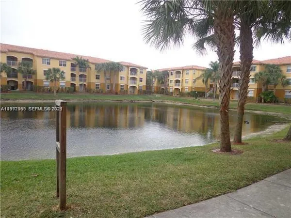 a view of a lake with a house
