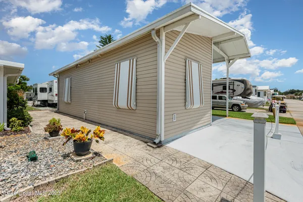 a view of a house with a patio
