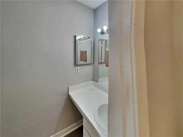 a bathroom with a bathtub and toilet