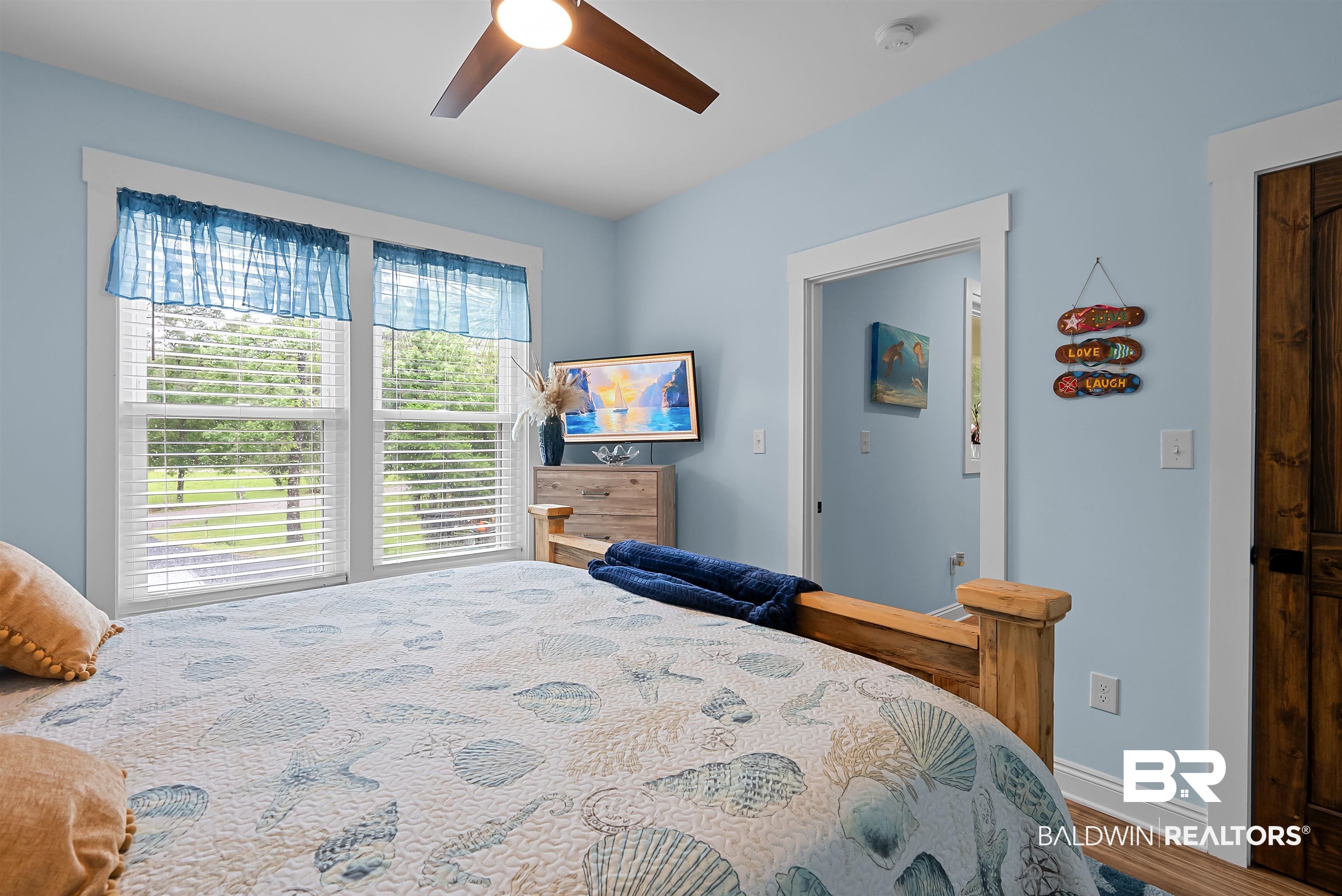 7266 Franklin Road Foley, AL 36535 - Photo 39 of 64 Bright room with wood-finish flooring and light blue walls