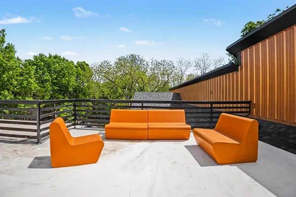 swimming pool with an outdoor seating