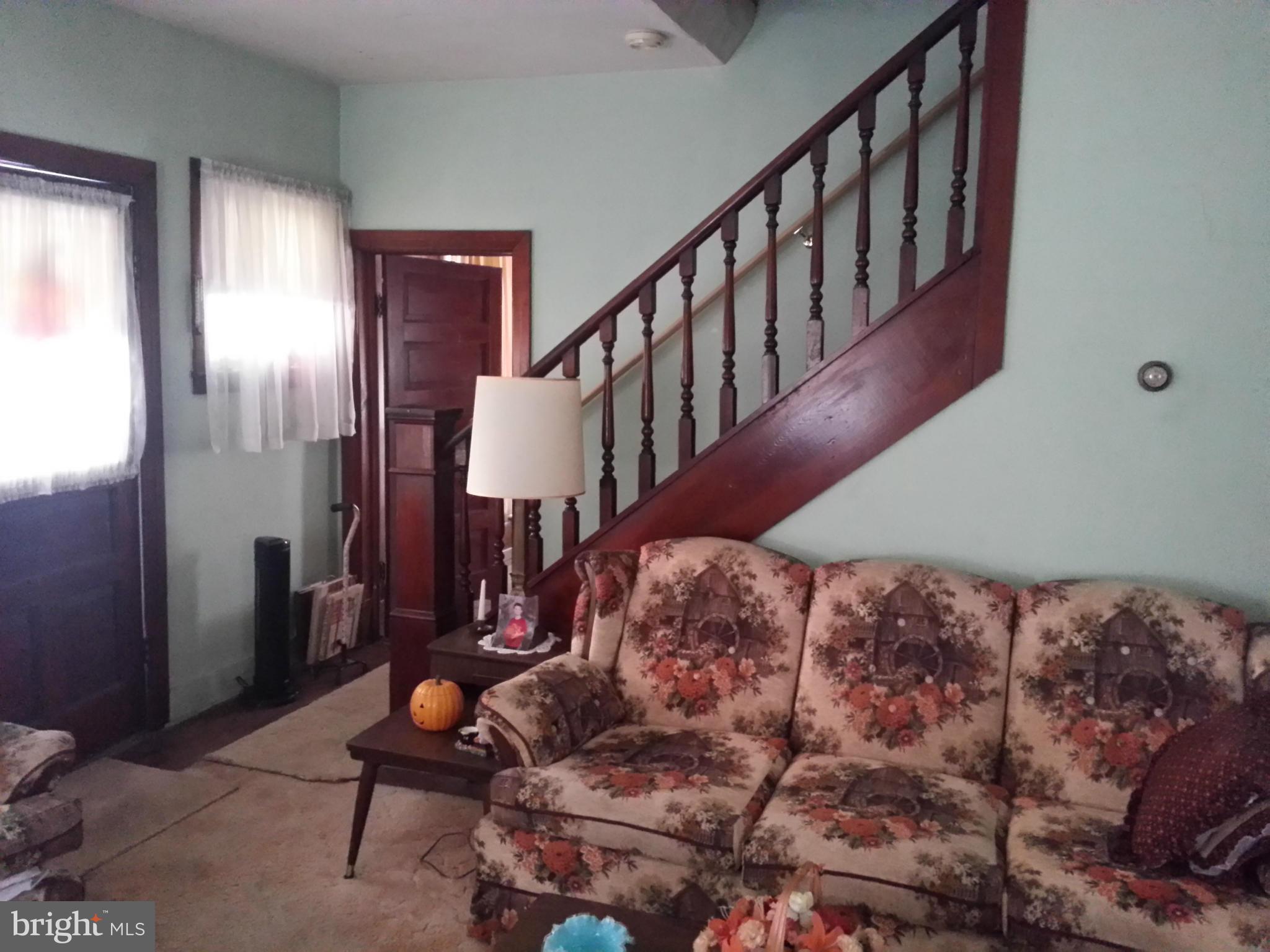 25307 Highfield Road Cascade, MD 21719 - Photo 11 of 16 a view of entryway livingroom and hall with wooden floor