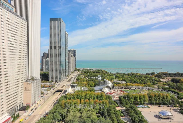 a view of city with ocean