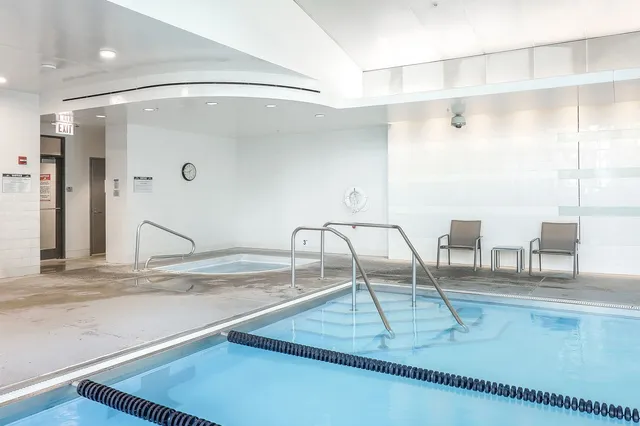 a view of a lobby with gym equipment