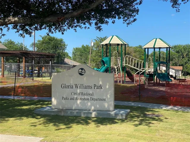 a view of swimming pool with outdoor seating and deck