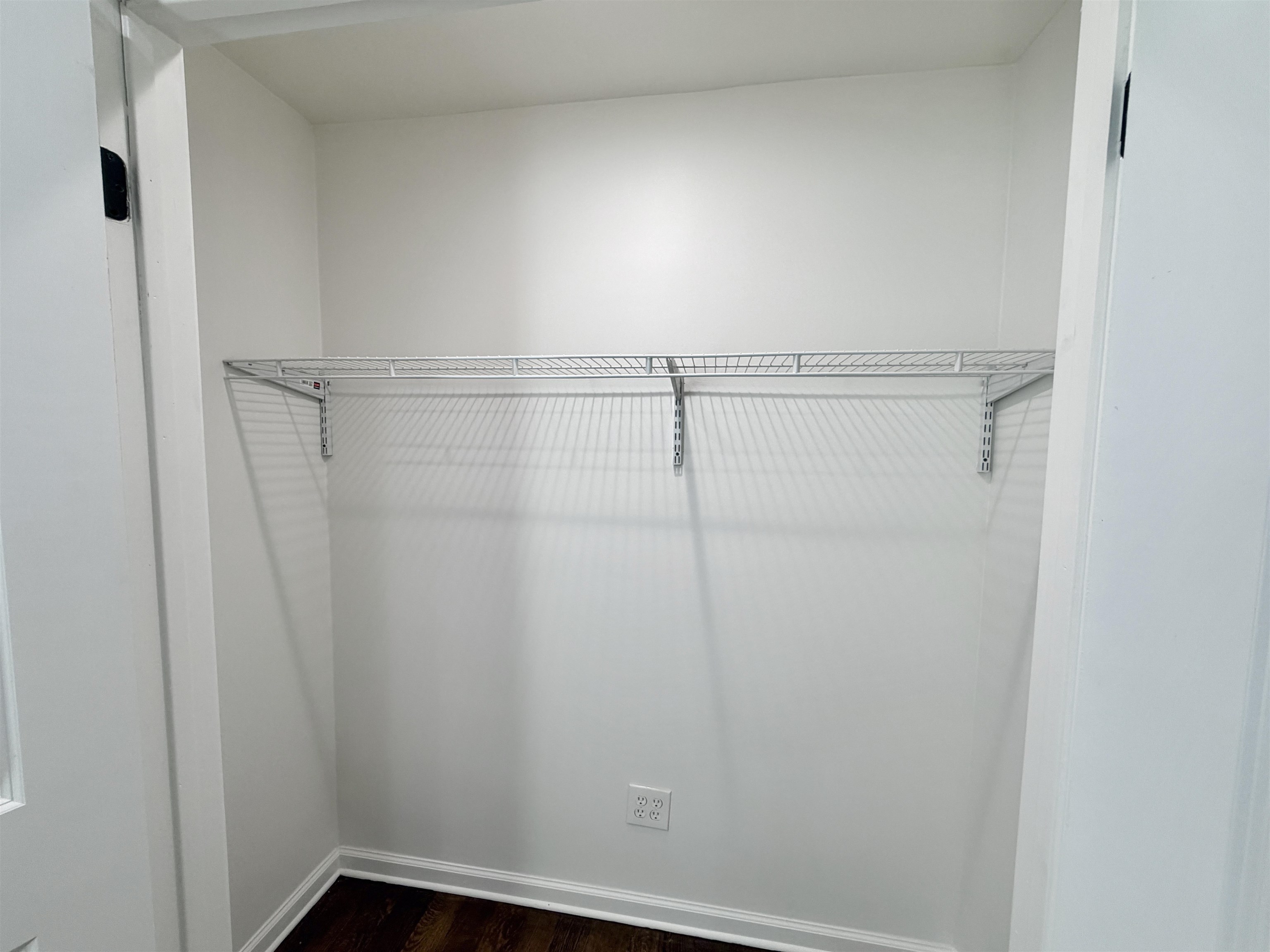 9526 Osborn Road Arlington, TN 38002 - Photo 28 of 40 Large closet featuring dark hardwood flooring