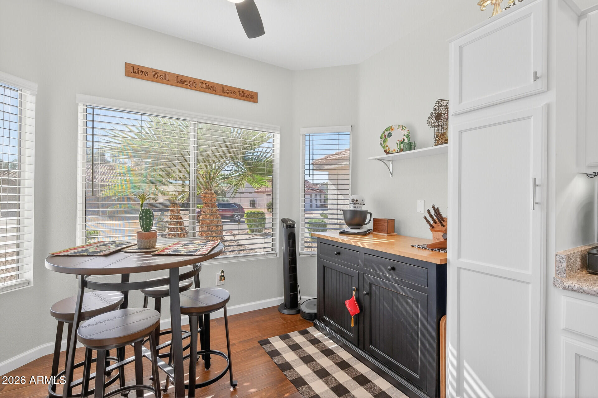 16100 West Eagle Ridge Drive Surprise, AZ 85374 - Photo 13 of 44 a view of a kitchen area with furniture and windows