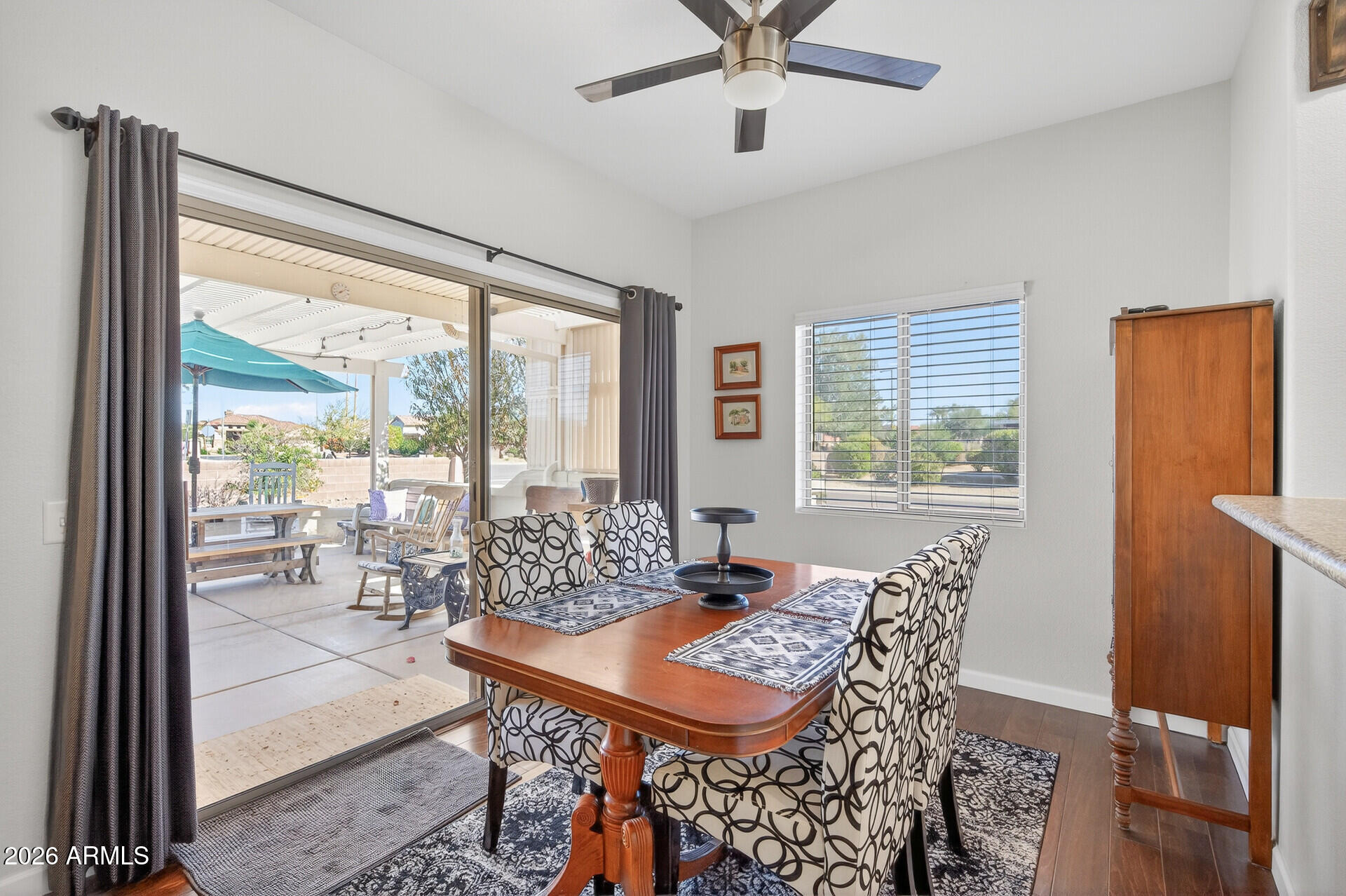 16100 West Eagle Ridge Drive Surprise, AZ 85374 - Photo 15 of 44 a view of a dining room with furniture window and outside view