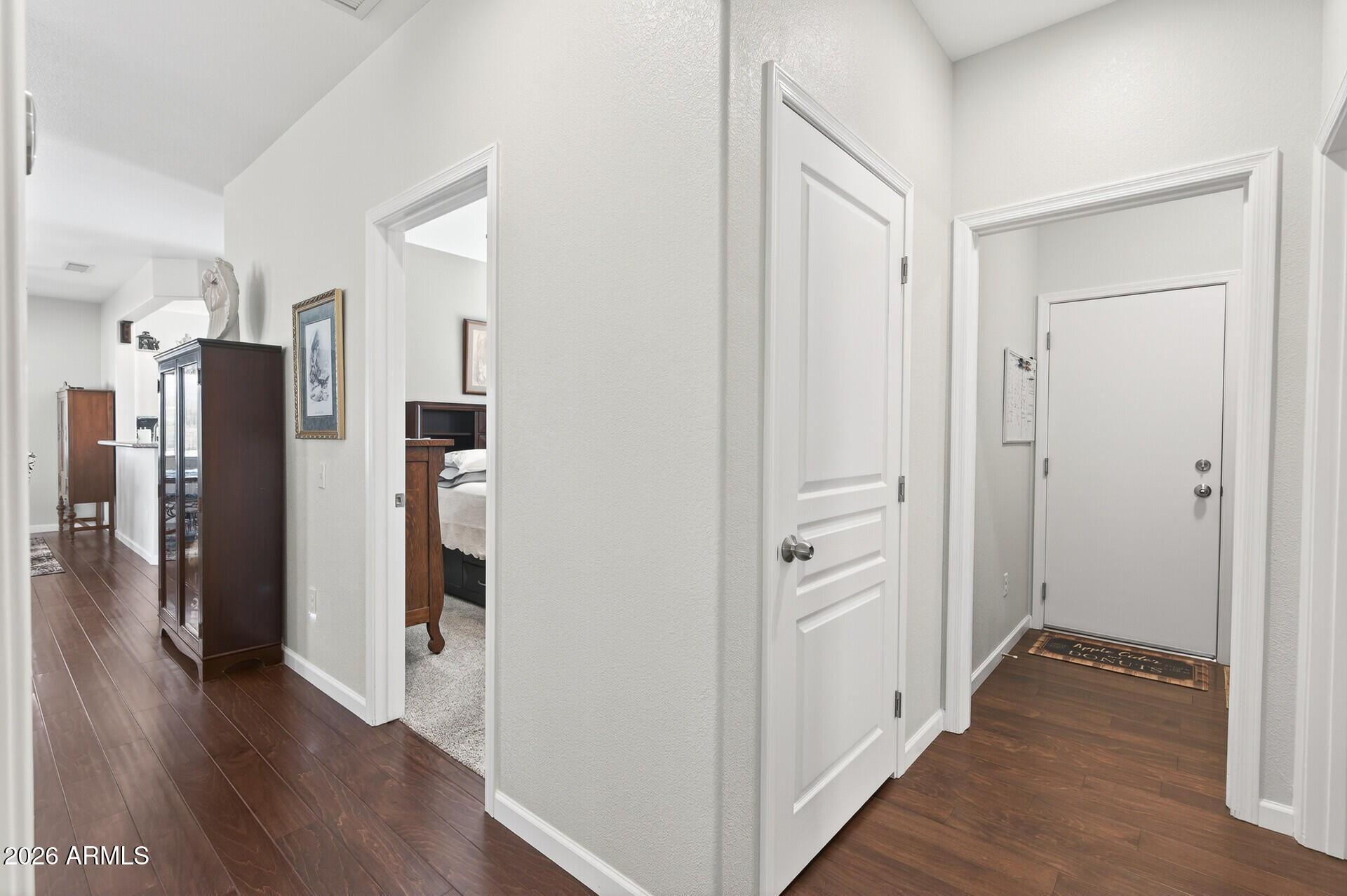 16100 West Eagle Ridge Drive Surprise, AZ 85374 - Photo 29 of 44 a view of a hallway with wooden floor