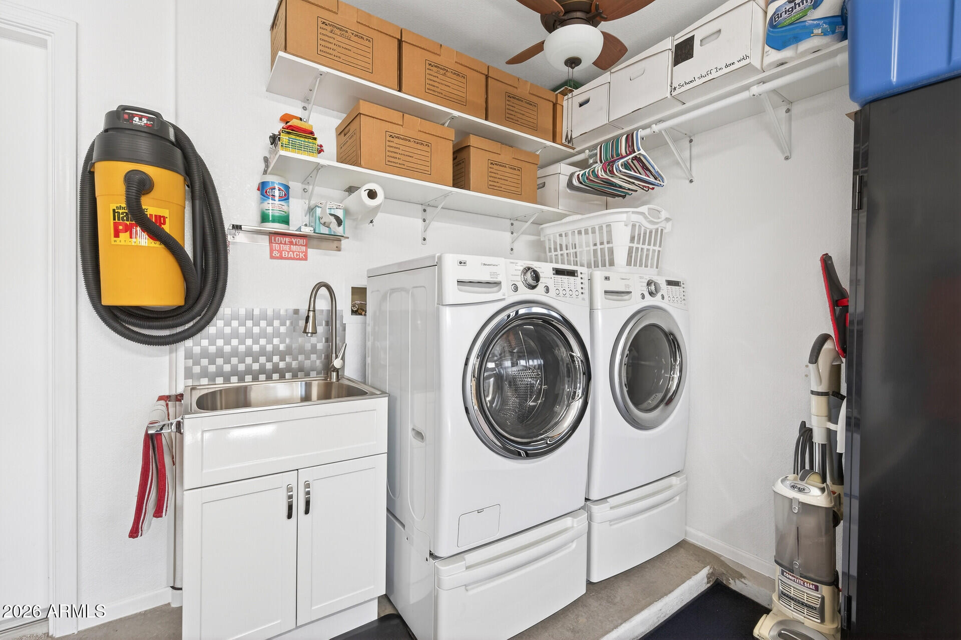 16100 West Eagle Ridge Drive Surprise, AZ 85374 - Photo 33 of 44 a utility room with dryer and washer