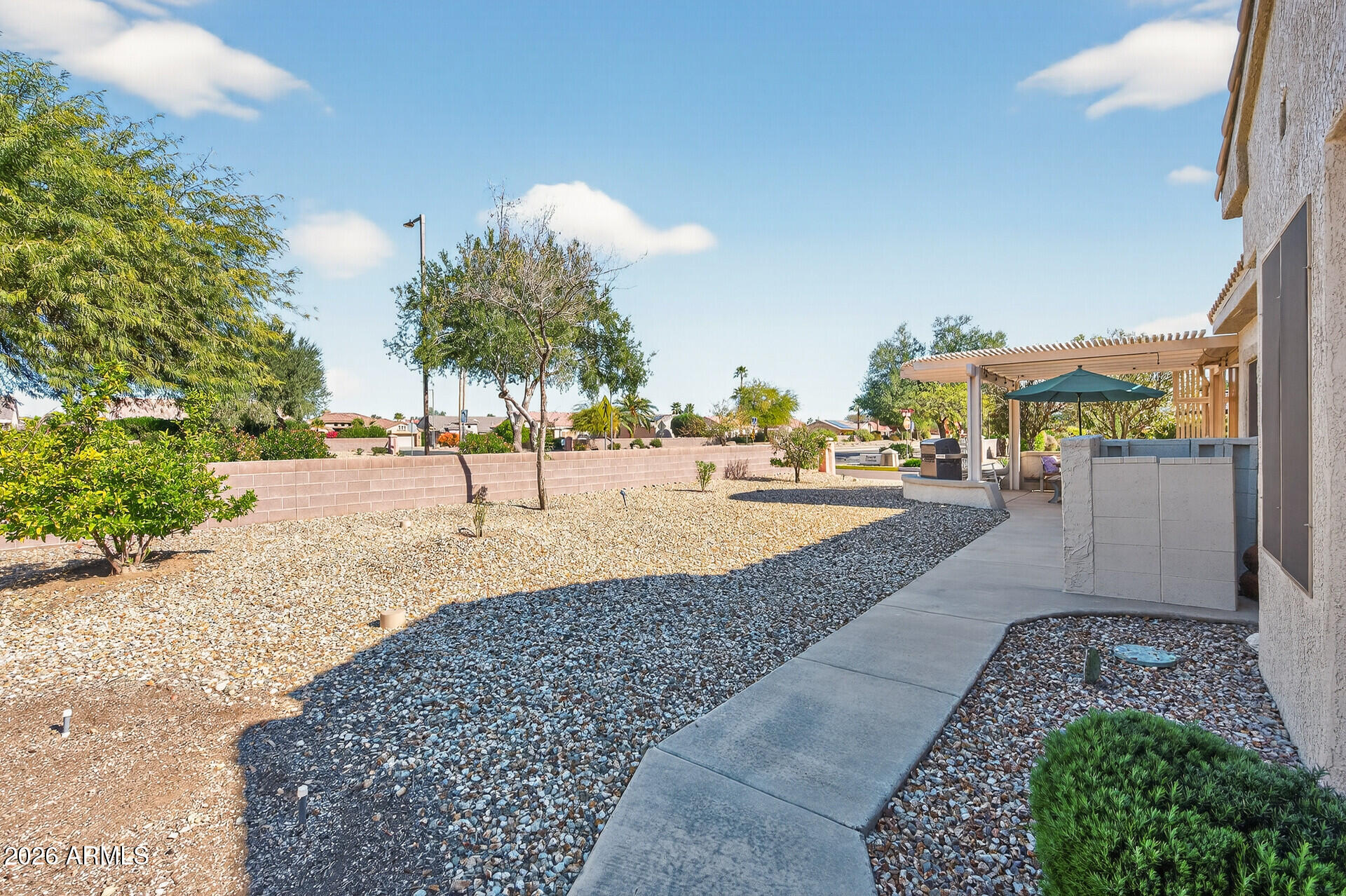 16100 West Eagle Ridge Drive Surprise, AZ 85374 - Photo 40 of 44 a view of a yard and front view of a house