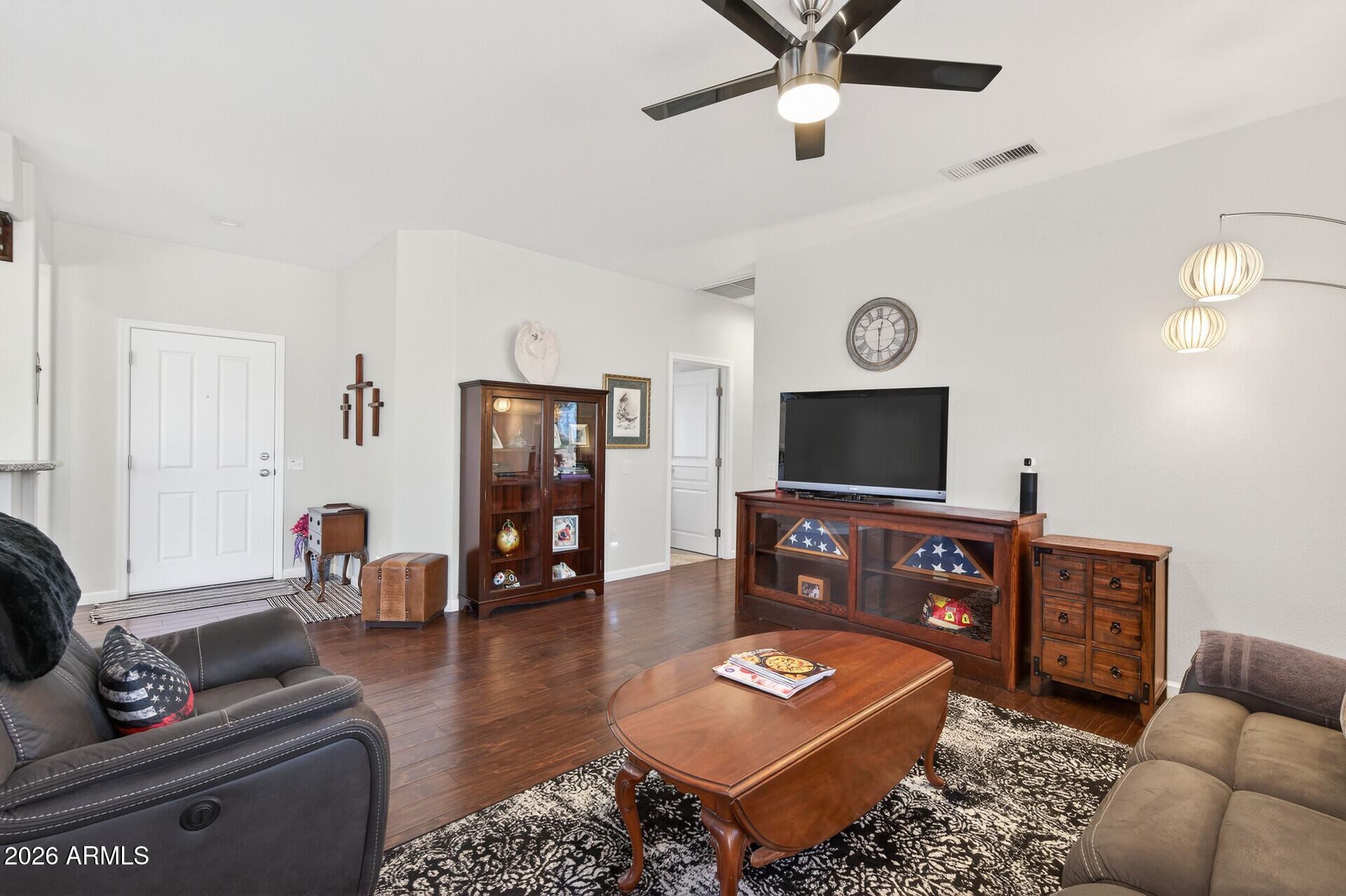 16100 West Eagle Ridge Drive Surprise, AZ 85374 - Photo 10 of 44 a living room with furniture and a flat screen tv