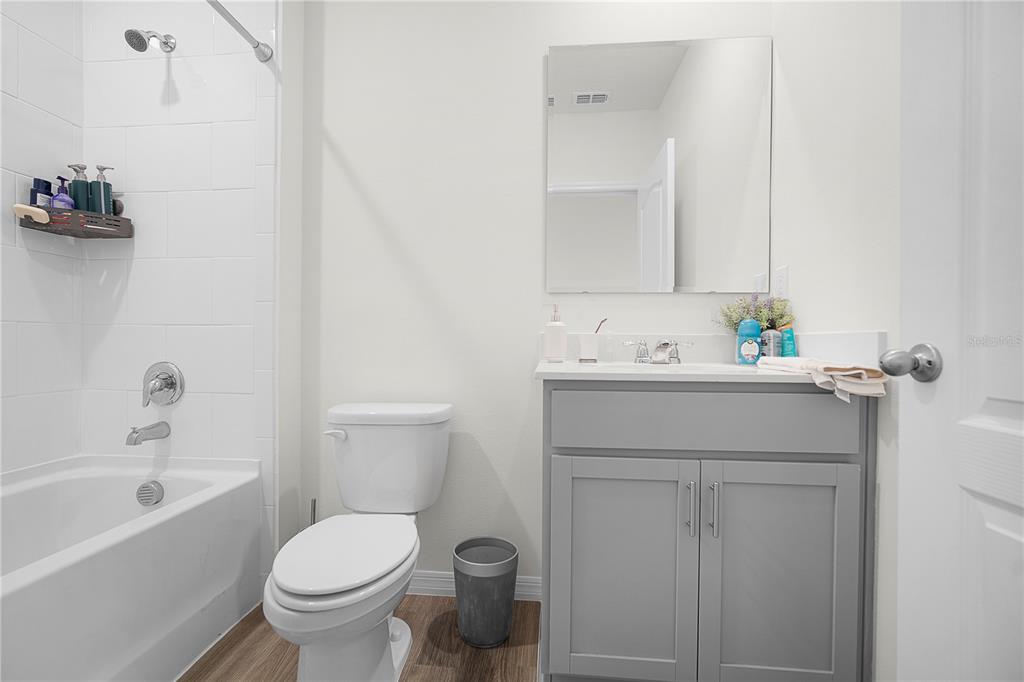 1606 Bull Hl Road Kissimmee, FL 34744 - Photo 15 of 38 a bathroom with a sink toilet and bathtub