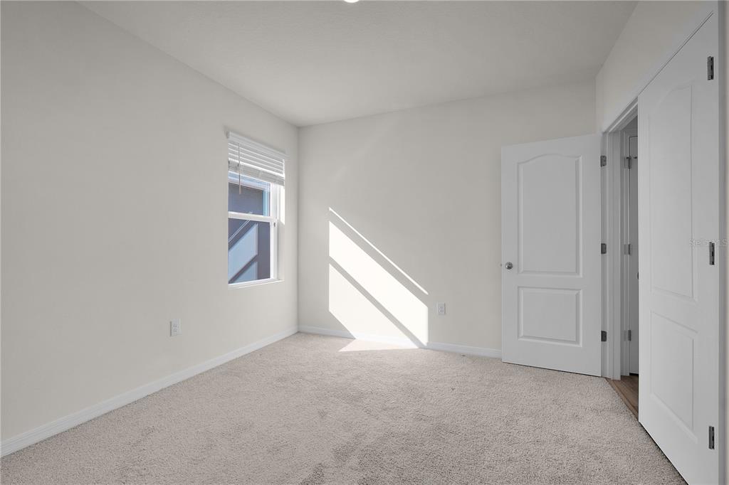 1606 Bull Hl Road Kissimmee, FL 34744 - Photo 24 of 38 a view of empty room with windows