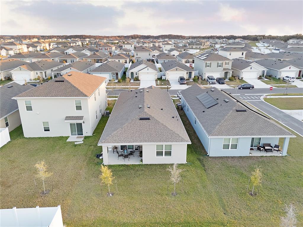 1606 Bull Hl Road Kissimmee, FL 34744 - Photo 7 of 38 an aerial view of residential houses with yard