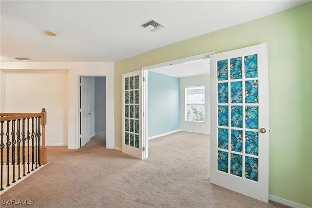 an empty room with windows