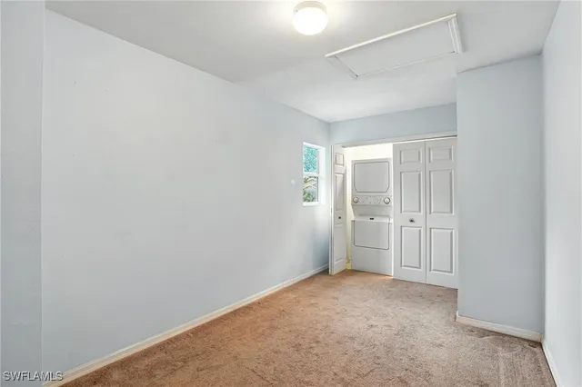a bathroom with a granite countertop shower and a sink