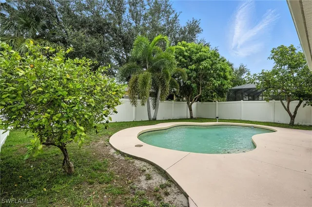 a view of a house with swimming pool