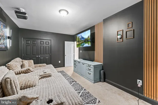 a group of people on a street in front of building