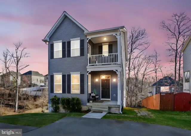 an aerial view of a house with a garden