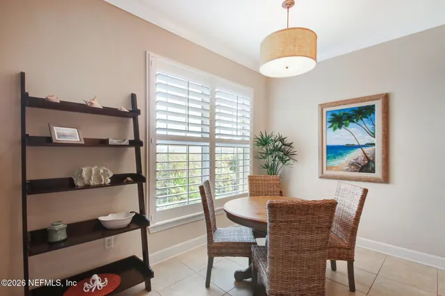 a stove top oven sitting inside of a kitchen