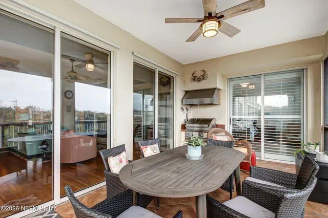a bedroom with double bed and a flat screen tv