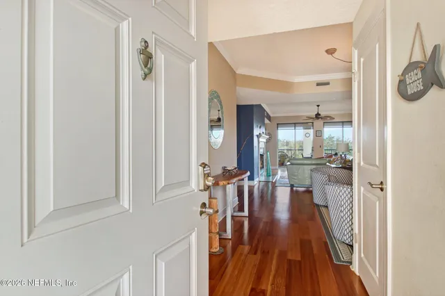 a view of a living room and dining room
