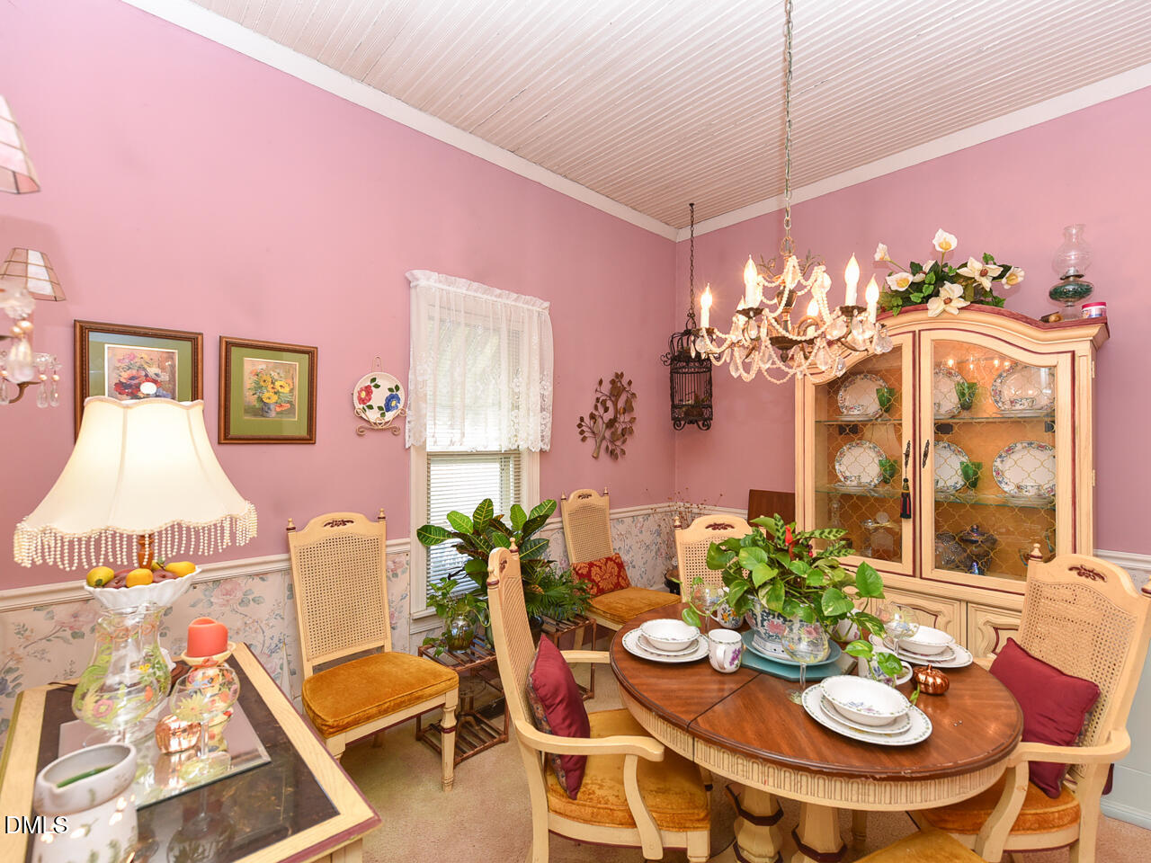 314 West Main Street Benson, NC 27504 - Photo 16 of 30 a view of a dining room with furniture and chandelier