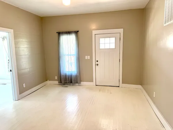 an empty room with windows