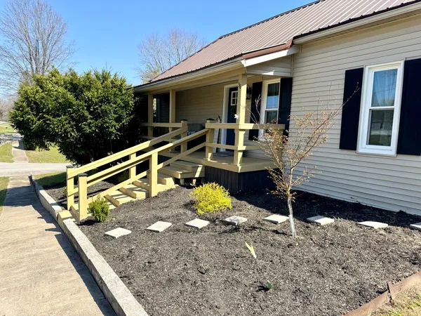 a view of a balcony with chairs