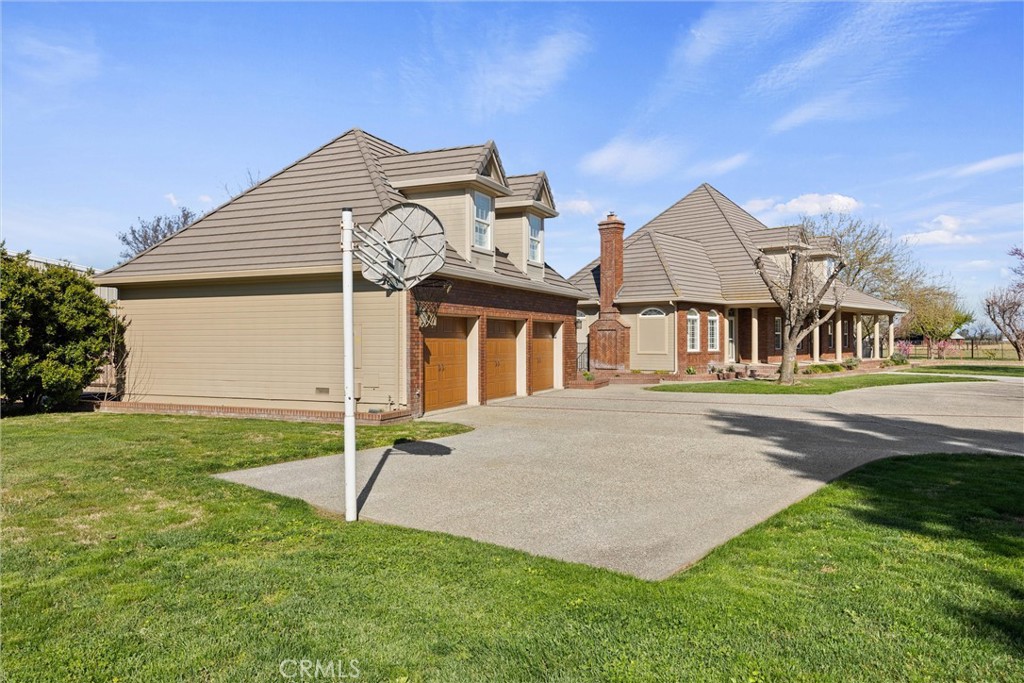6310 County Road 18 Orland, CA 95963 - Photo 56 of 72 a front view of a house with a yard