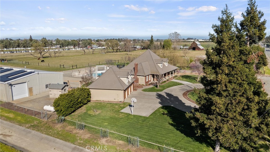 6310 County Road 18 Orland, CA 95963 - Photo 67 of 72 an aerial view of a house with a garden and lake view