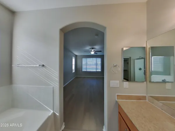a view of a bathroom from the hallway