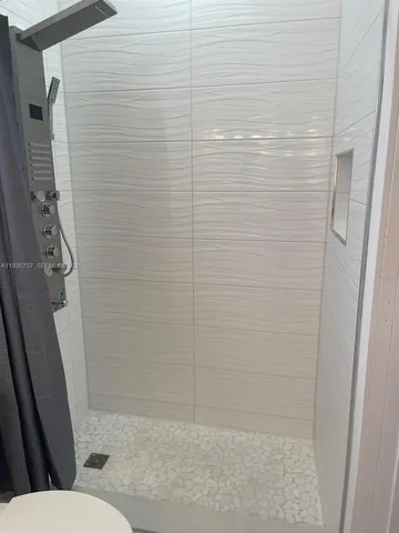 a bathroom with a shower