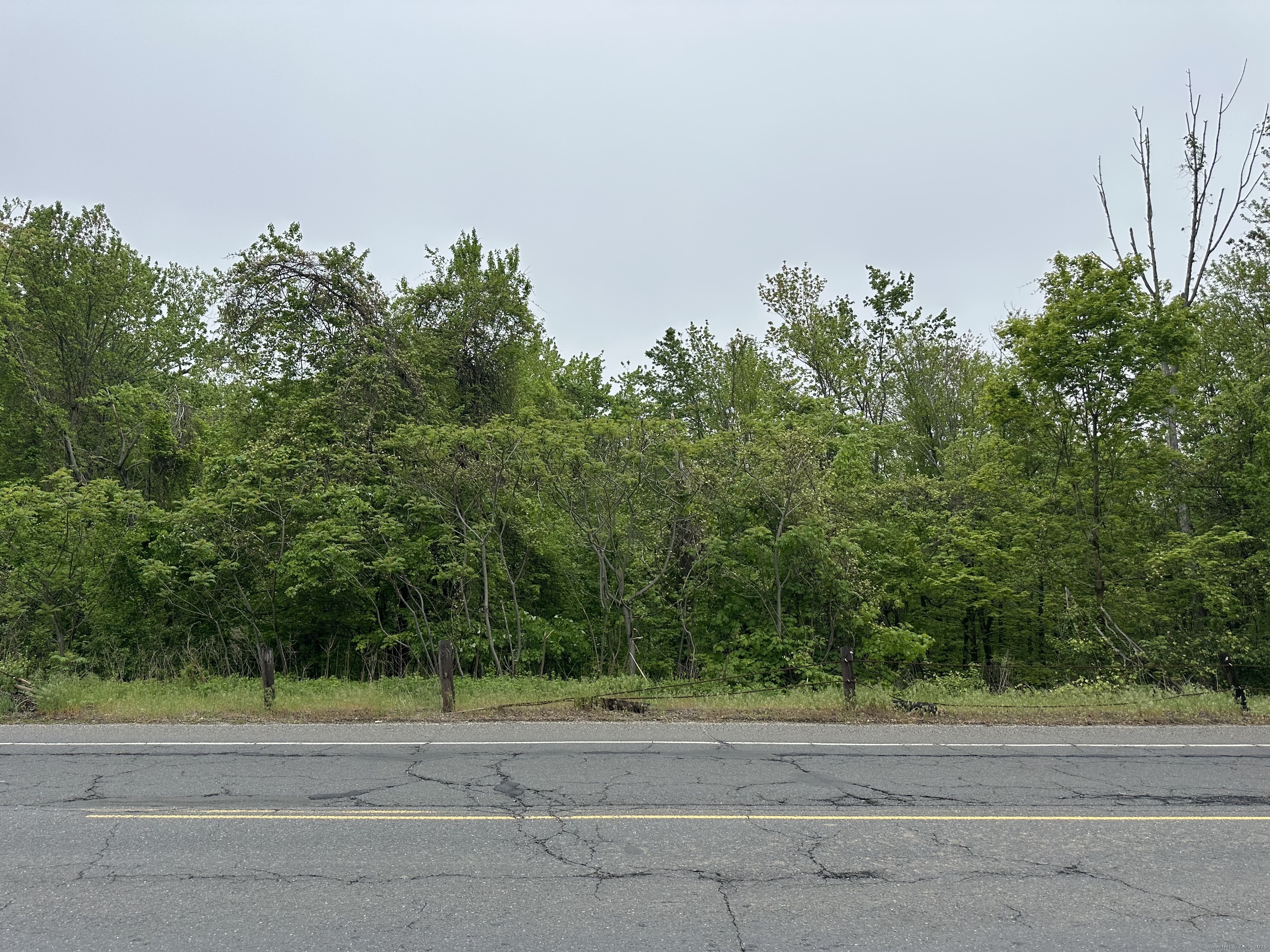 66 Union City Road Prospect, CT 06712 - Photo 2 of 8 a backyard of a house with lots of green space