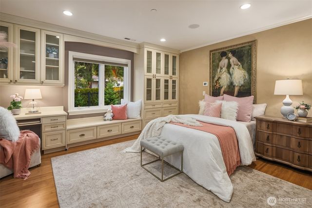 a front view of a house with a yard table and chairs