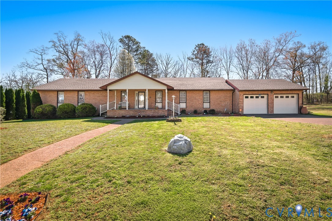 107 Oxford Road Hopewell, VA 23860 - Photo 2 of 50 Brick exterior with an inviting covered porch and