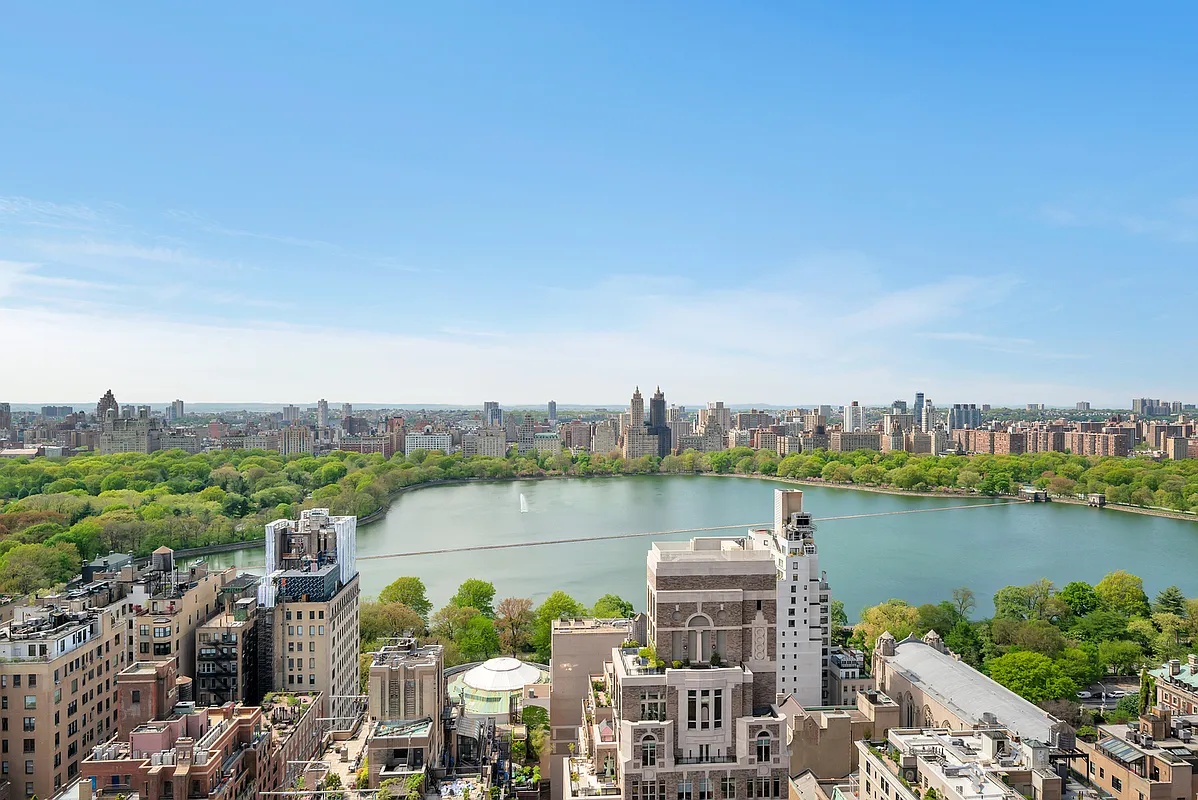 50 East 89th Street, Unit 3C Manhattan, NY 10128 - Photo 11 of 16 a view of a lake with building in front of it