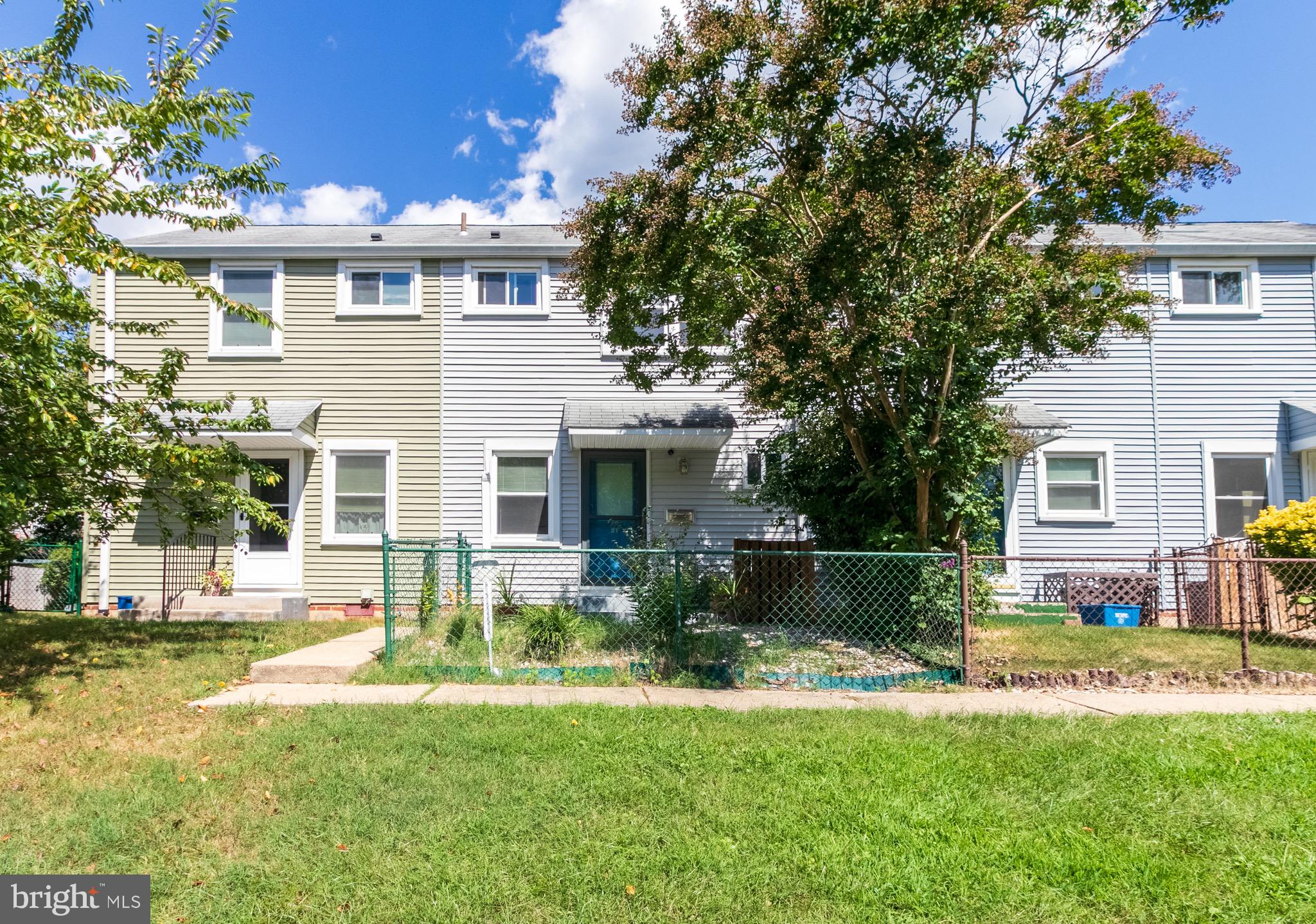 2 Laurel Hill Road Greenbelt, MD 20770 - Photo 19 of 19 a front view of a house with a yard and a porch