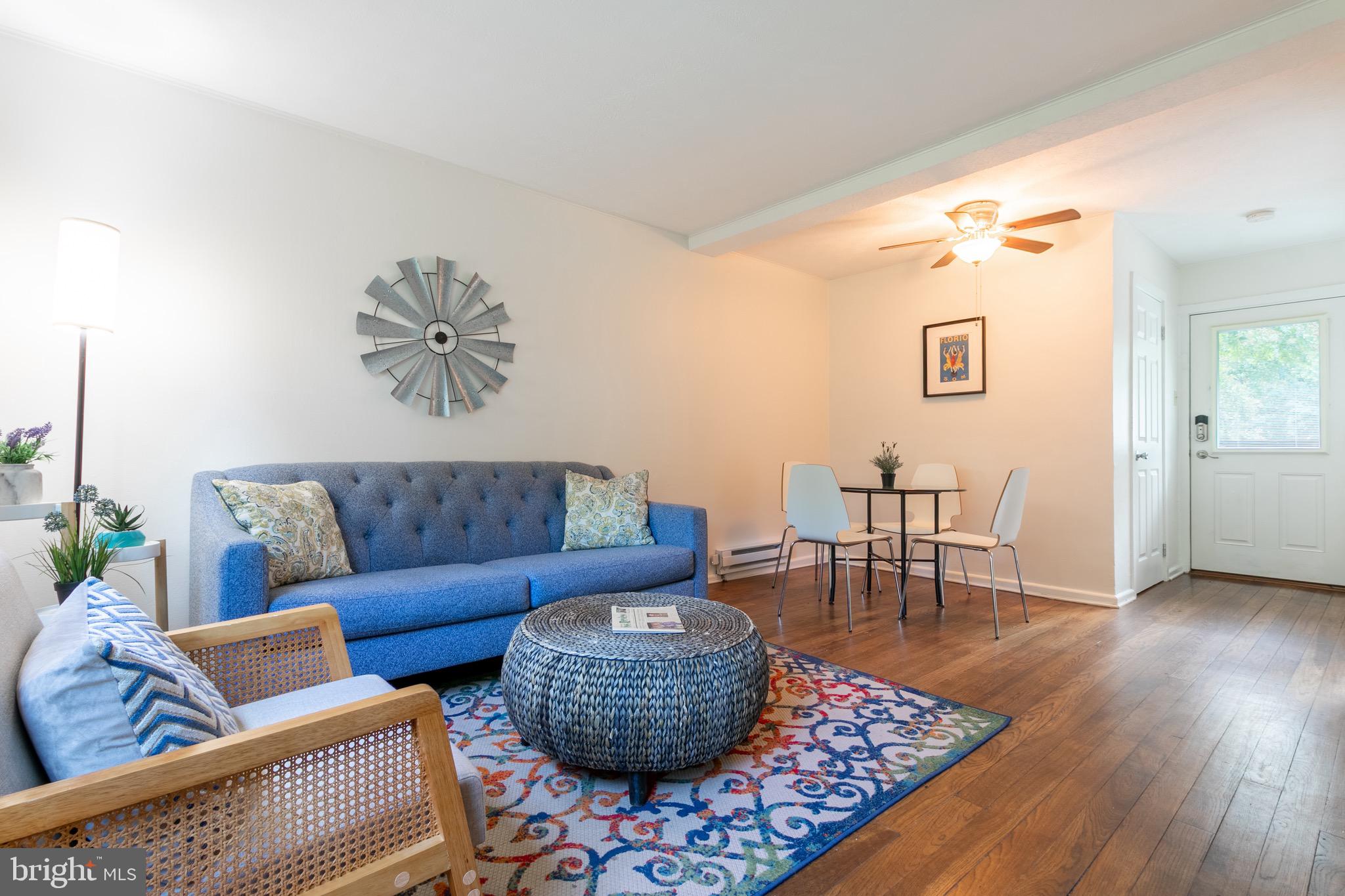 2 Laurel Hill Road Greenbelt, MD 20770 - Photo 8 of 19 a living room with furniture and wooden floor