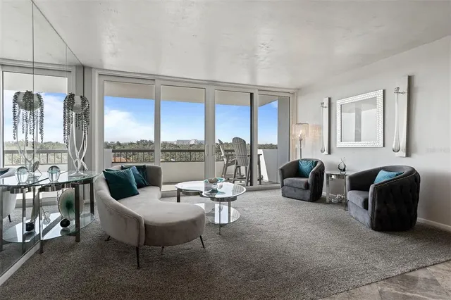 a kitchen with granite countertop stainless steel appliances and wooden cabinets