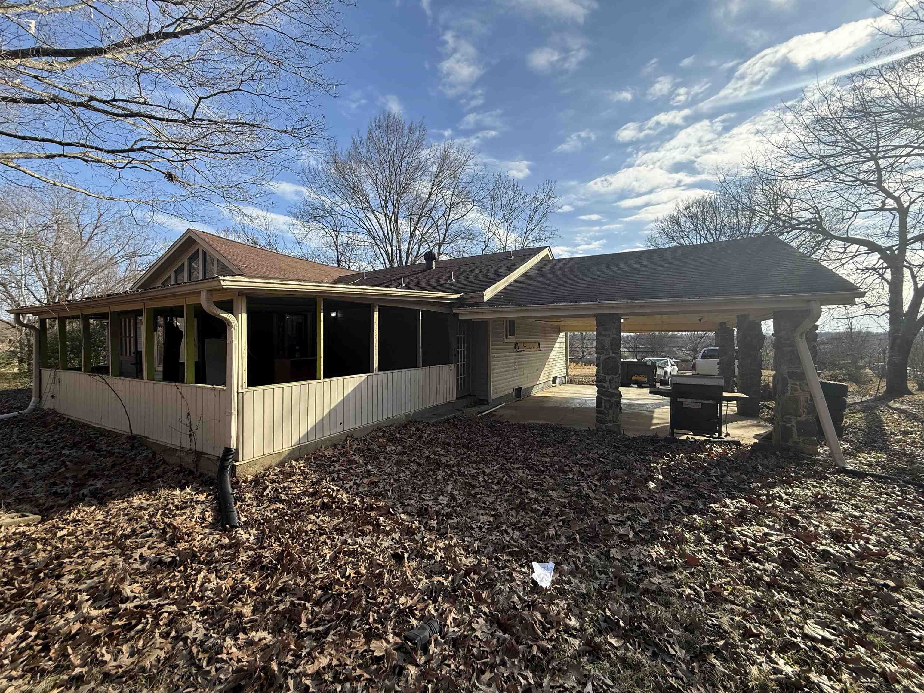 10320 Macon Road Cordova, TN 38016 - Photo 3 of 17 a front view of a house with a garden