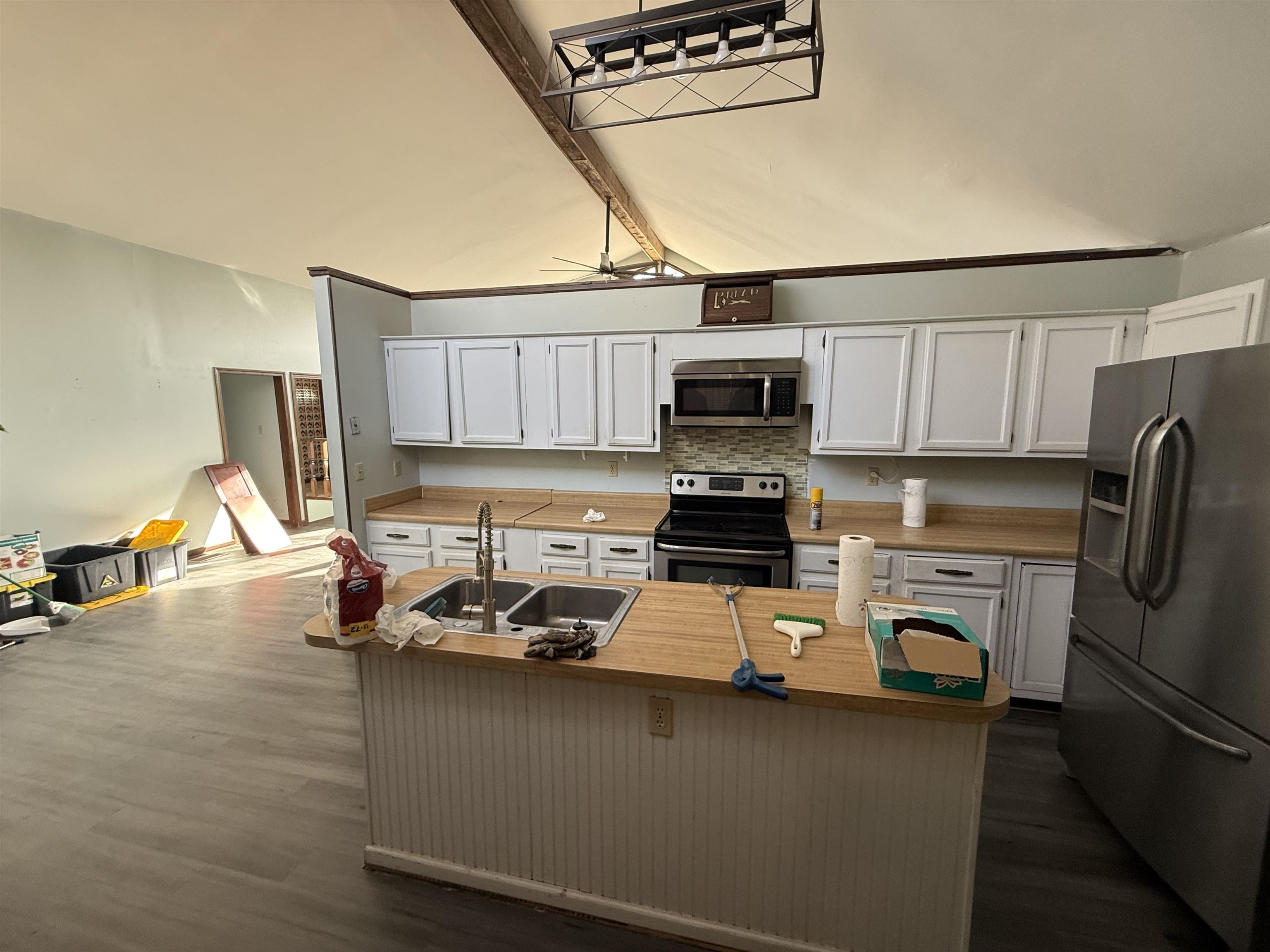 10320 Macon Road Cordova, TN 38016 - Photo 7 of 17 a kitchen with a sink appliances and cabinets
