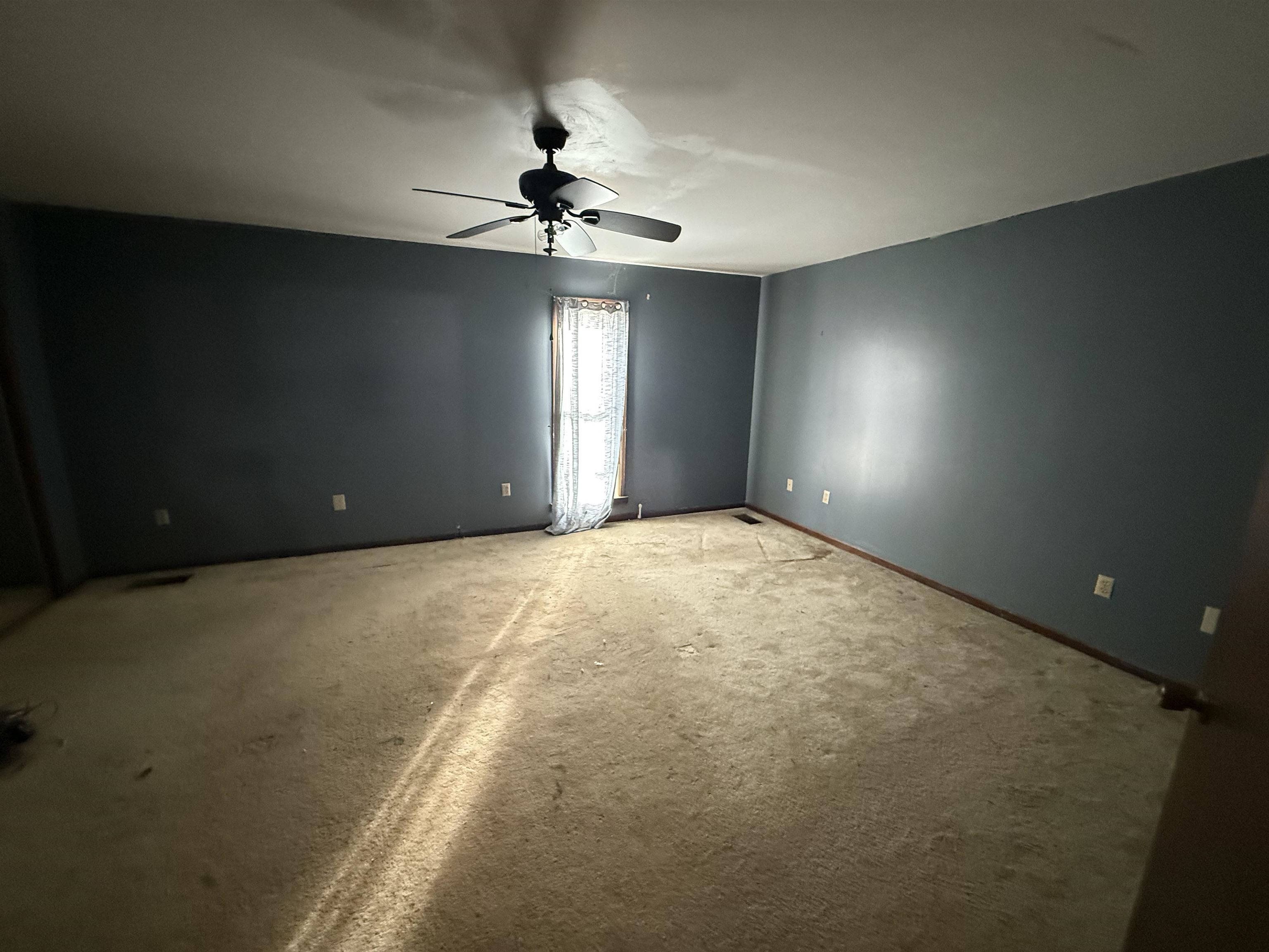 10320 Macon Road Cordova, TN 38016 - Photo 9 of 17 a view of an empty room with a window