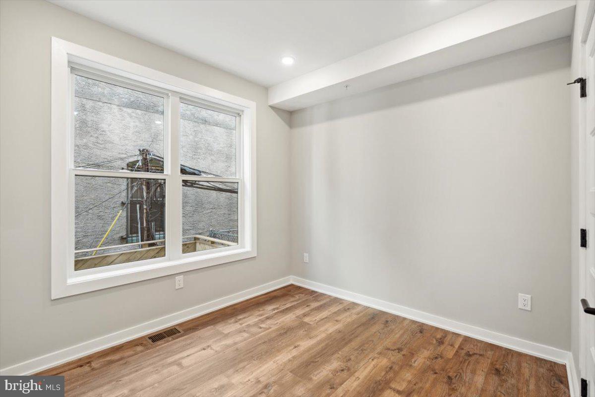 3801 Hamilton Street, Unit B Philadelphia, PA 19104 - Photo 19 of 46 a view of an empty room with a window